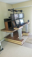 actuating height adjustable computer desk